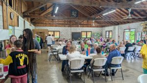 picture of Friends enjoying lunch at QK 75th anniversary kick-off May 2026